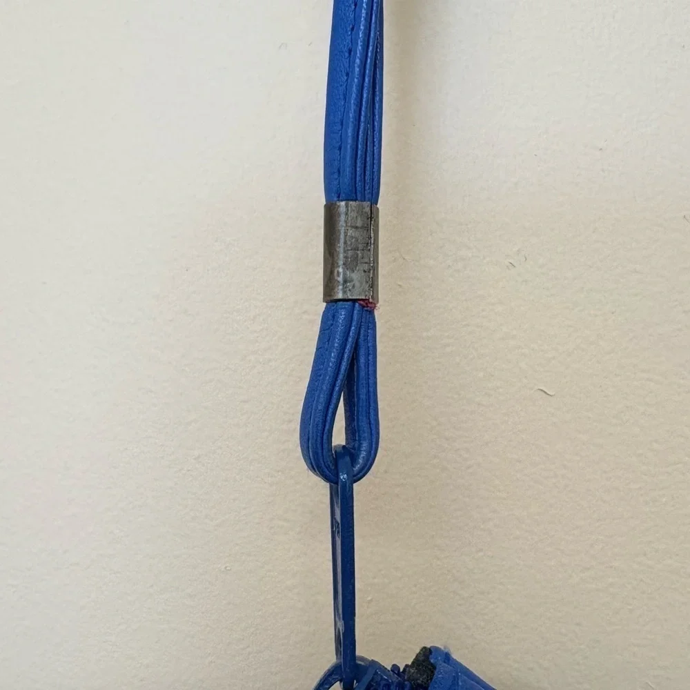 Vintage Toni blue genuine leather wristlet with bow.